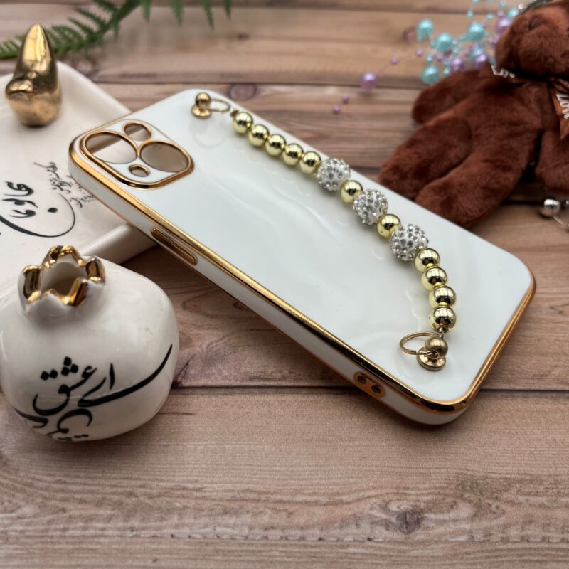 قاب گوشی iPhone 13 آیفون مای کیس لاکچری My Case دستبندی نگین دار مرواریدی محافظ لنز دار سفید دور طلایی کد 67887 - Image 2