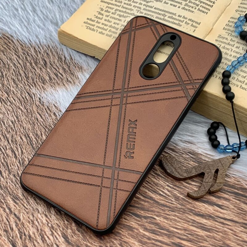 قاب گوشی Huawei Mate 10 Lite هوآوی چرمی دور ژله ای طرح برجسته REMAX کلاسیک محافظ لنز دار قهوه ای کد 84442 - Image 2