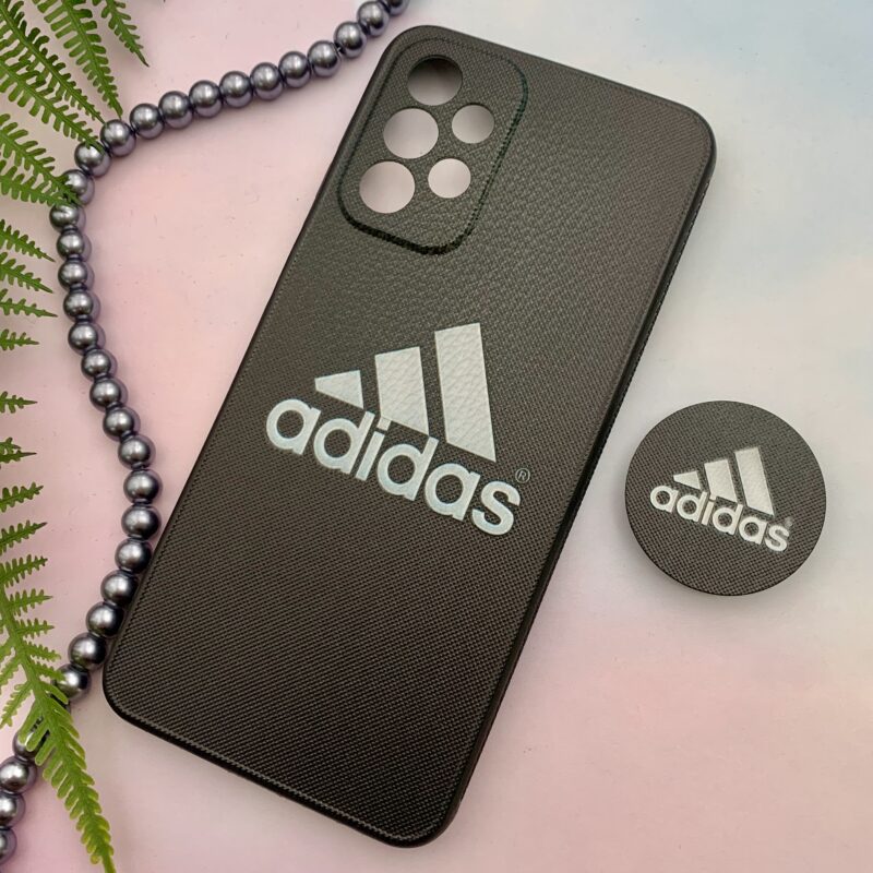 قاب گوشی A23 سامسونگ فانتزی برجسته سوزنی طرح Adidas محافظ لنزدار پاپ سوکت دار کد 64165 - Image 2