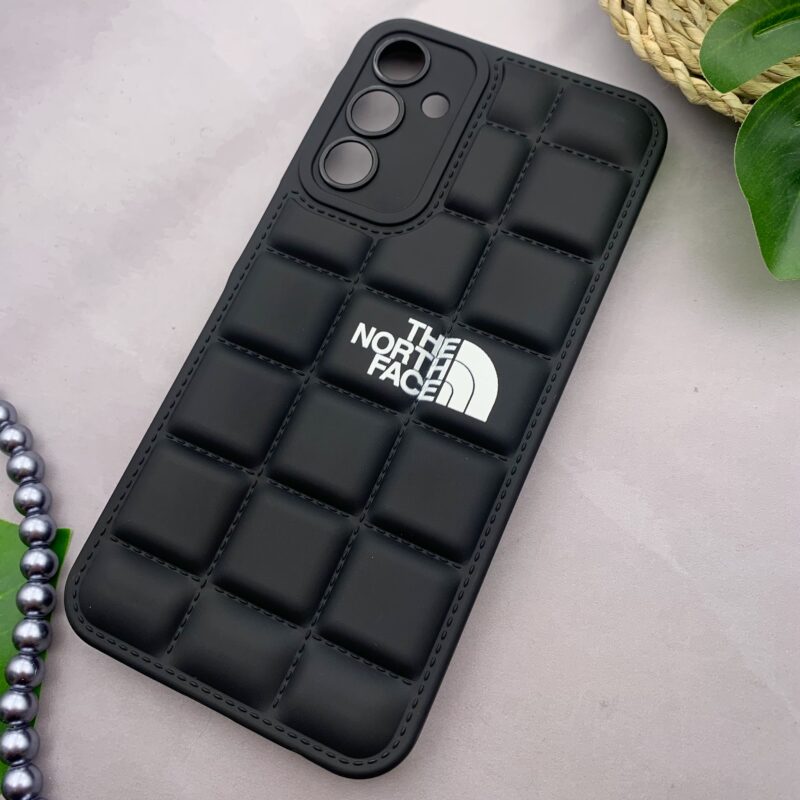 قاب گوشی Galaxy A15 سامسونگ سیلیکونی پافری برجسته Kit Kat طرح The North Face محافظ لنز دار مشکی کد 99580 - Image 2