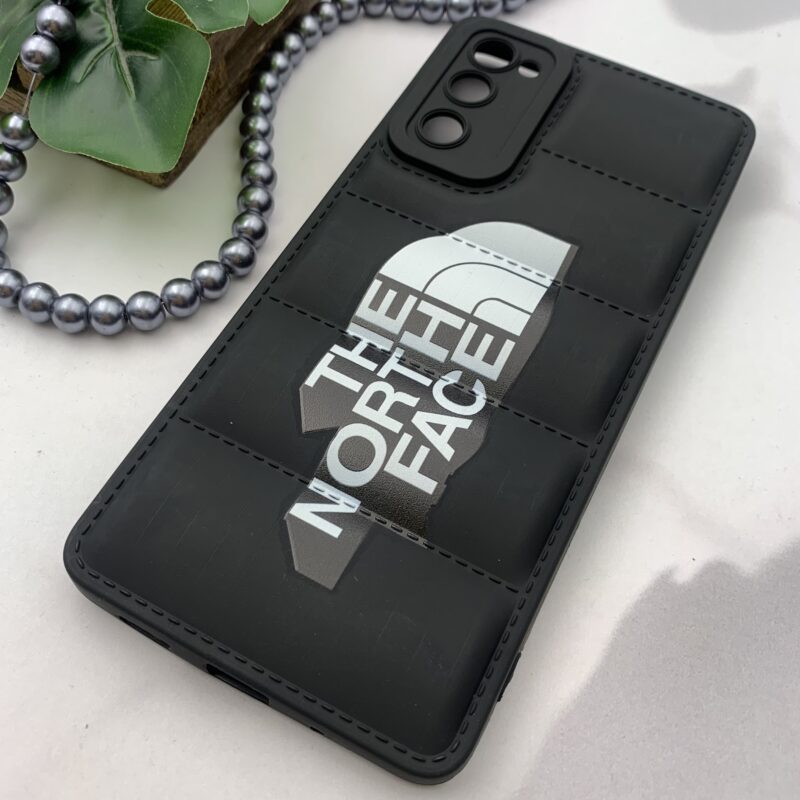 قاب گوشی Galaxy S20 FE سامسونگ سیلیکونی پافری برجسته محافظ لنز دار طرح The North Face مشکی کد 38079 - Image 2