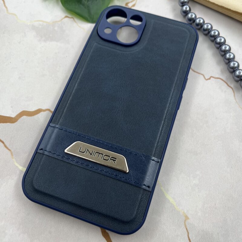 قاب گوشی iPhone 13 آیفون چرم UNIMOR اورجینال دوختی لوگو فلزی سرمه ای محافظ لنز دار کد 20362 - Image 2