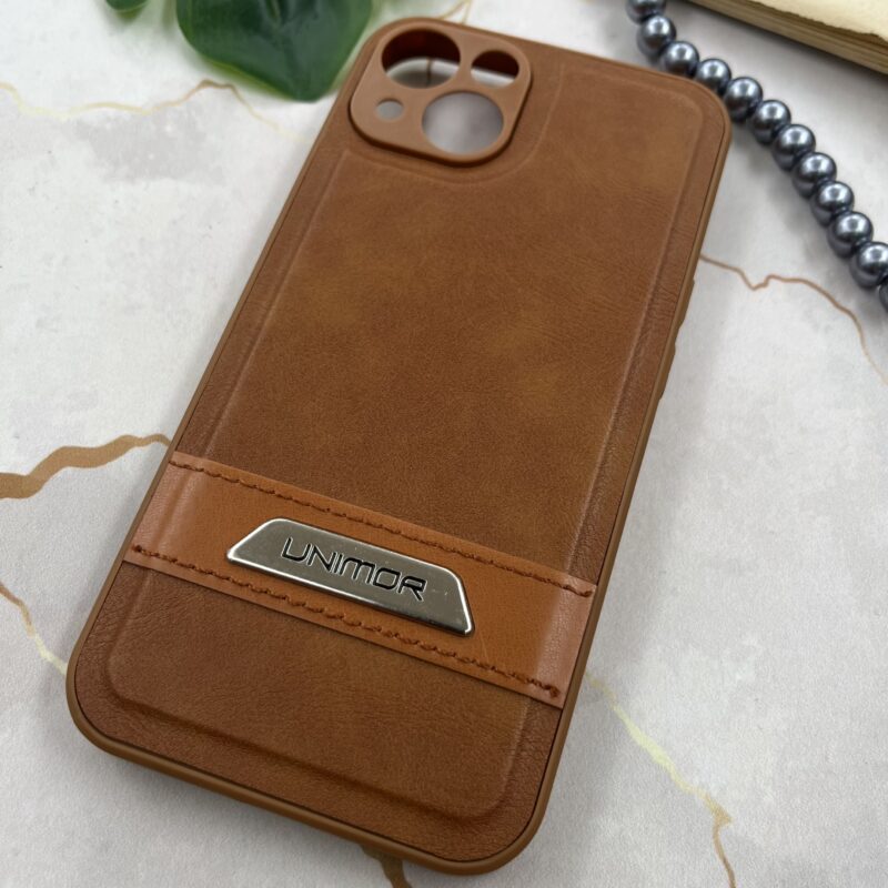 قاب گوشی iPhone 13 آیفون چرم UNIMOR اورجینال دوختی لوگو فلزی عسلی محافظ لنز دار کد 49753 - Image 2