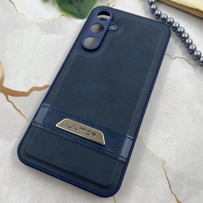 قاب گوشی Galaxy S23 FE سامسونگ چرم UNIMOR اورجینال دوختی لوگو فلزی سرمه ای محافظ لنز دار کد 68543 - Image 2
