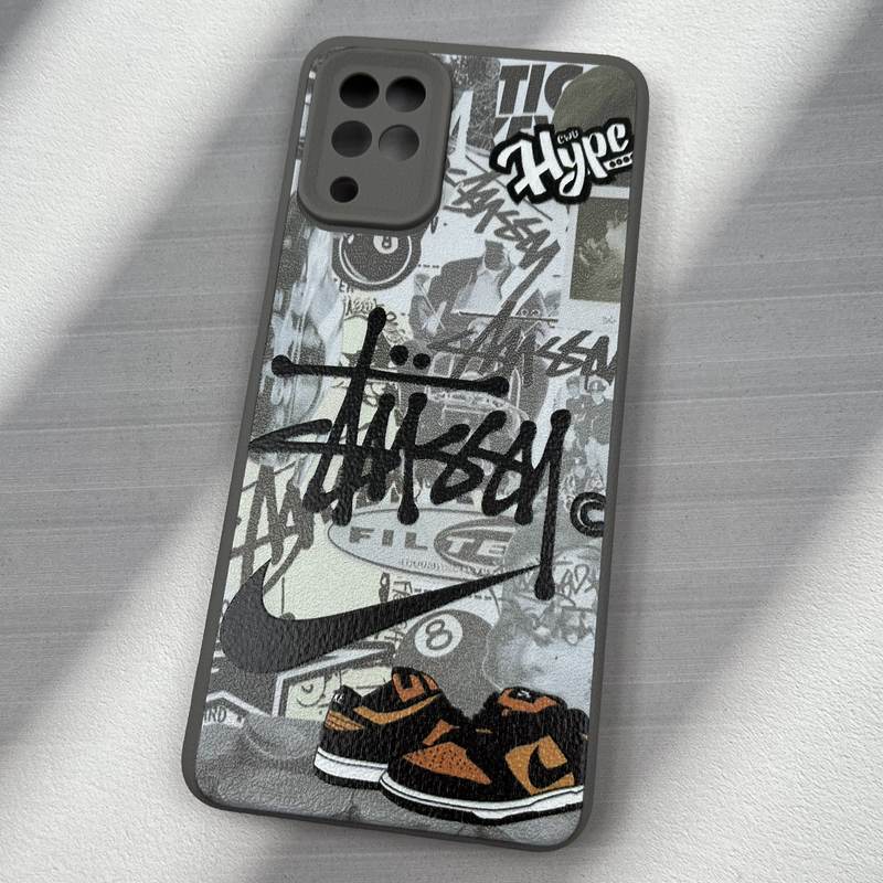 قاب گوشی Galaxy A12 / Galaxy M12 سامسونگ سیلیکونی طرح چرم Leather Design فانتزی NIKE نایک طوسی محافظ لنز دار کد 84388 - Image 2