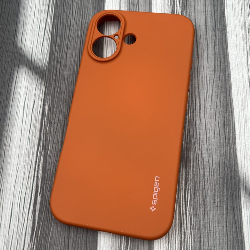 قاب گوشی iPhone 16 آیفون سیلیکونی Spigen اورجینال داخل پارچه ای محافظ لنز دار نارنجی کد 81050 - Image 2