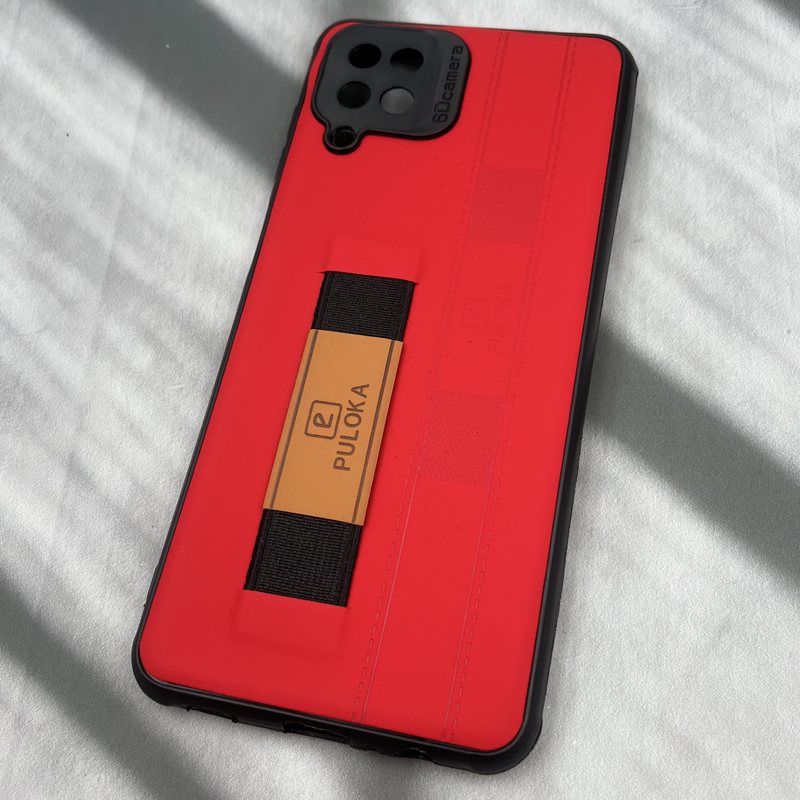 قاب گوشی Galaxy A12 / Galaxy M12 سامسونگ فینگر بند ایربگ دار چرم Puloka چرم قرمز محافظ لنز دار کد 18947 - Image 2