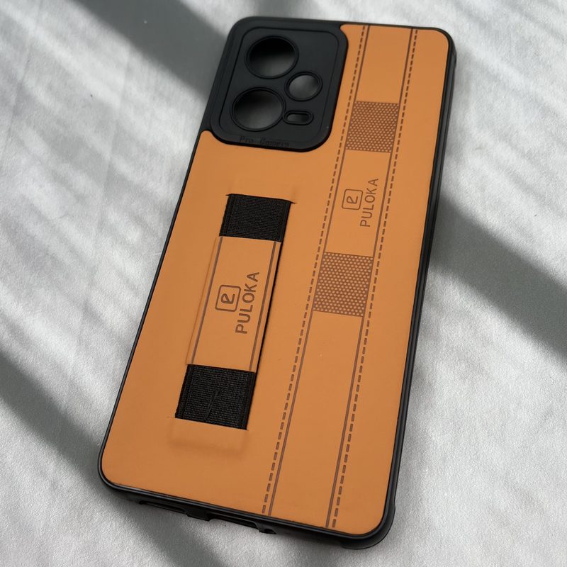 قاب گوشی Redmi Note 12 Pro 5G شیائومی فینگر بند ایربگ دار چرم Puloka چرم عسلی محافظ لنز دار کد 92288 - Image 2