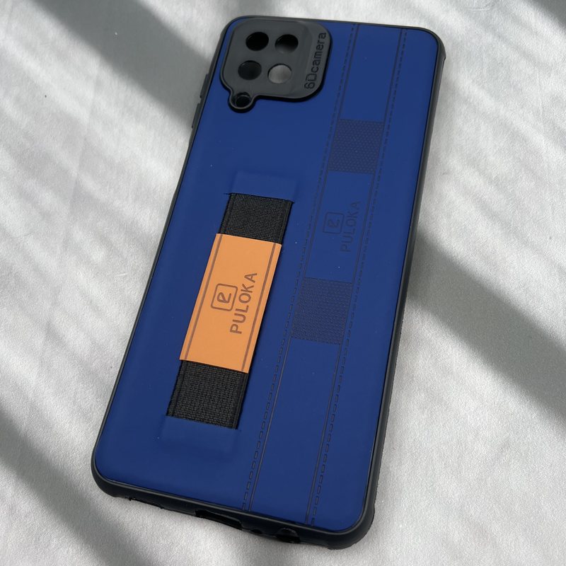 قاب گوشی Galaxy A12 / Galaxy M12 سامسونگ فینگر بند ایربگ دار چرم Puloka چرم آبی کاربنی محافظ لنز دار کد 93331 - Image 2