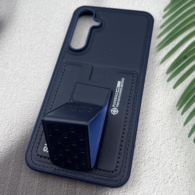 قاب گوشی Galaxy S23 FE سامسونگ جاکارتی استندشو SKINARMA چرم پولو دوخت دار سرمه ای کد 13706 - Image 2