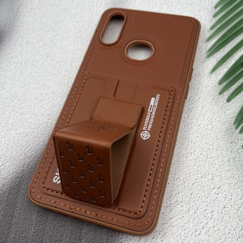 قاب گوشی Galaxy A10S سامسونگ جاکارتی استندشو SKINARMA چرم پولو دوخت دار عسلی کد 23262 - Image 2