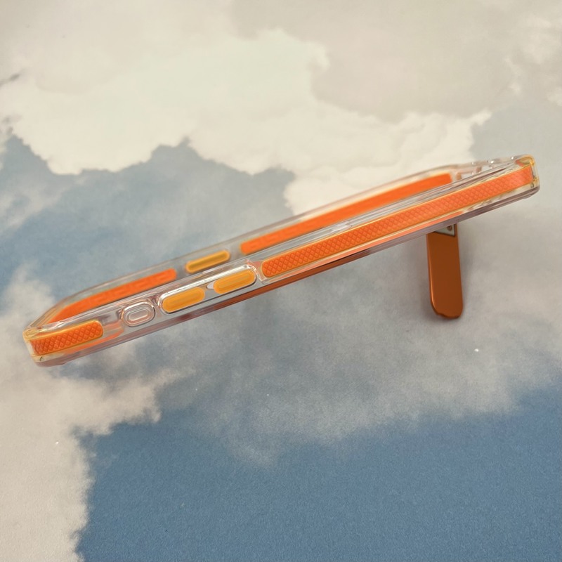 قاب گوشی iPhone 15 Pro Max آیفون Unique Case اورجینال مگ سیف Magsafe دار استندشو فلزی شفاف دور ایربگ دار نارنجی کد 85690 - Image 2