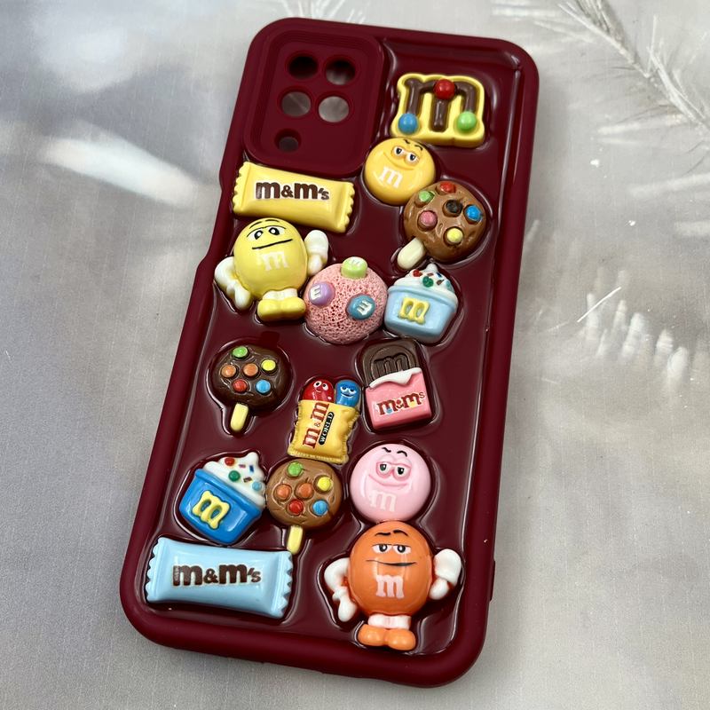 قاب گوشی Galaxy A12 / Galaxy M12 سامسونگ Solid Case سیلیکونی ضد ضربه طرح استیکر M&M محافظ لنز دار زرشکی کد 35160 - Image 2