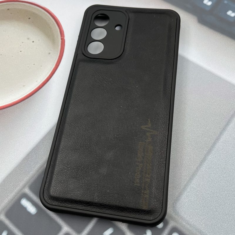 قاب گوشی Galaxy A17 سامسونگ چرمی اورجینال دور سیلیکونی AMG کلاسیک محافظ لنز دار مشکی کد 760903 - Image 2